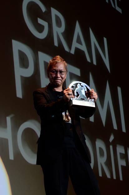 Takashi Miike con el premio honorífico