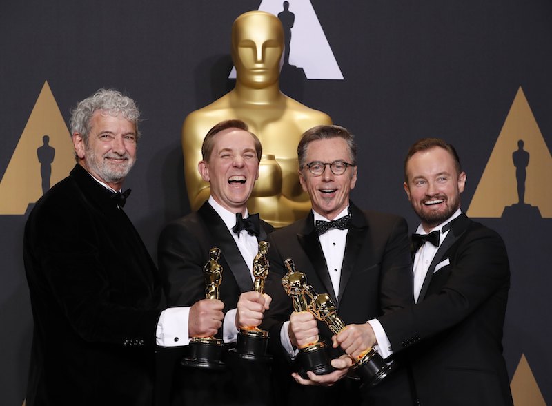89th Academy Awards - Oscars Backstage - Hollywood, California, U.S. - 26/02/17 – Kevin O'Connell, Andy Wright, Robert Mackenzie and Peter Grace, winners of best sound mixing for Hacksaw Ridge pose with their oscars. REUTERS/Lucas Jackson