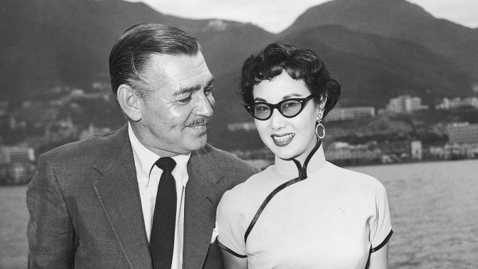 Mandatory Credit: Photo by Uncredited/AP/REX/Shutterstock (7340267a) Clark Gable, Li Li-Hua Actor Clark Gable poses with Li Li-Hua, Chinese movie star in Hong Kong, as they take a cruise together around Hong Kong Island where Gable is starring in the production of "Soldier of Fortune Gable Li